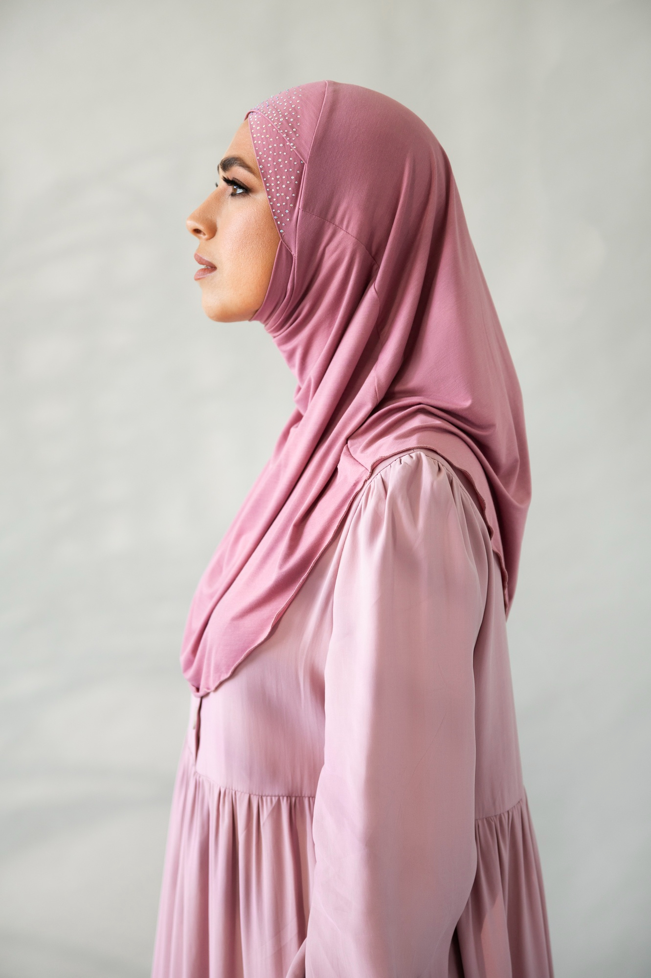 muslim-woman-wearing-pink-hijab-side-view