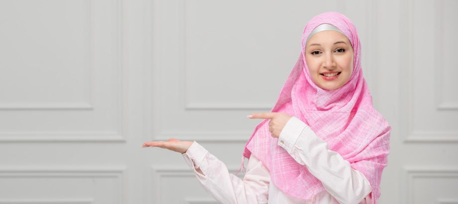 arabic-girl-pretty-cute-young-muslim-woman-wrapped-beautiful-pink-hijab-pointing-left arabic-girl-pretty-cute-young-muslim-woman-wrapped-beautiful-pink-hijab-pointing-left